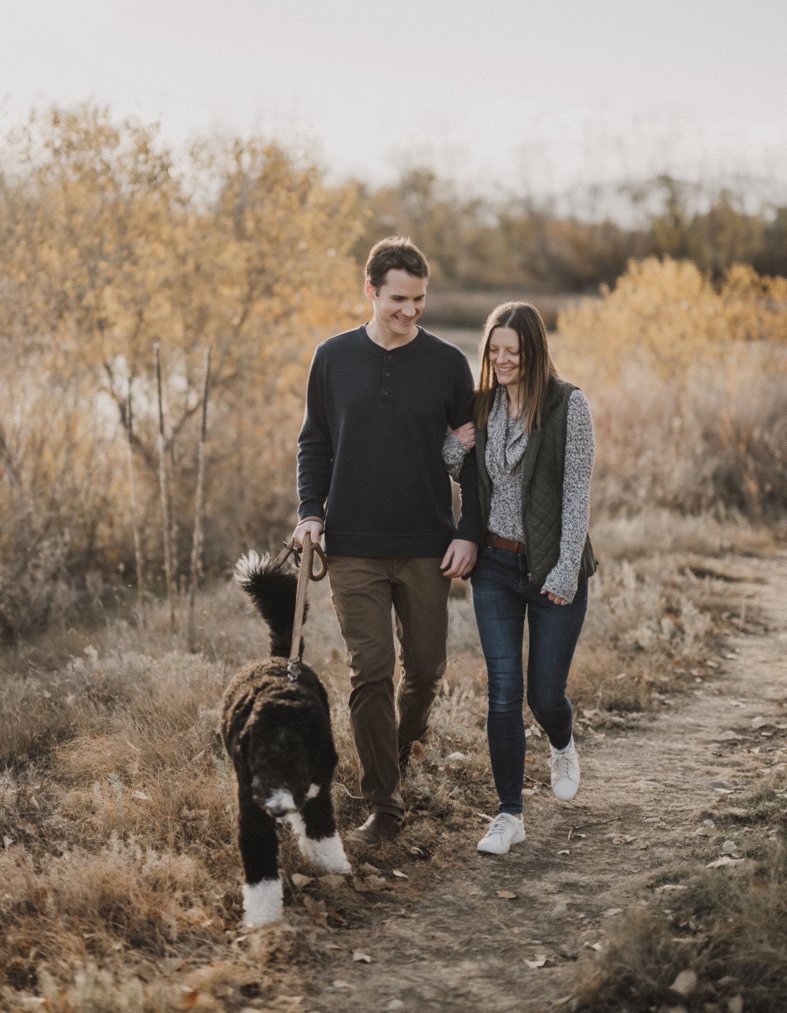 Lindsay and Jeff walking with Mira